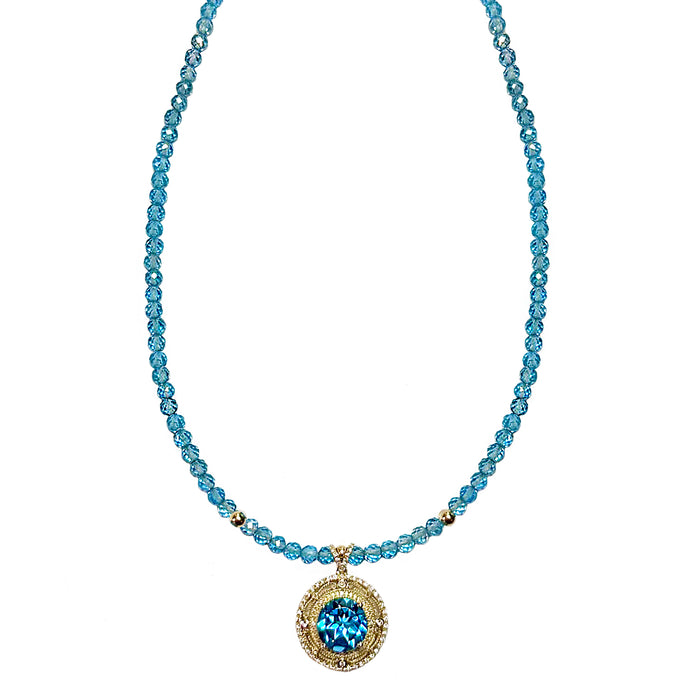 Swiss Blue Topaz and Diamond 14K gold pendant on a chain of Swiss Blue topaz